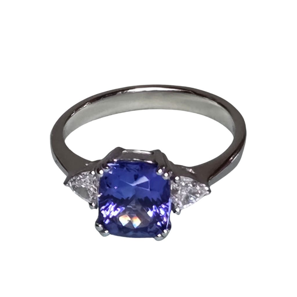 Cushion-Cut Tanzanite & Diamond Three-Stone Ring